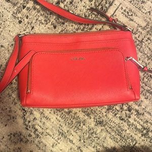Red Calvin Cline bag with long strap, Great condition.